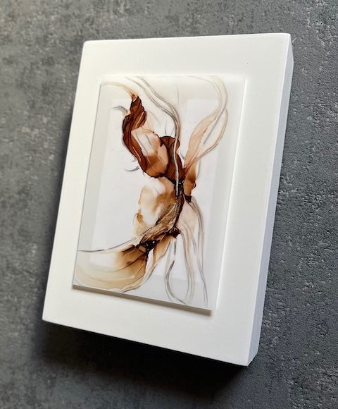 Abstract art featuring a nature spirit; symbolism art of shedding skin and returning to the seat of the soul, hand painted in brown, grey and gold on a white panel.