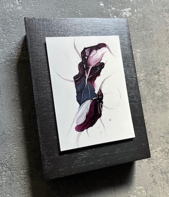 Surreal gothic art featuring a dark aesthetic and elements of hybrid animals symbolic of inner alchemy. This original art is float mounted on a black panel and hung on a grey wall.