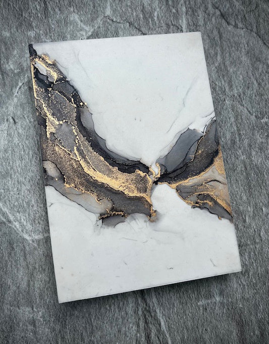 Symbolism art of alchemy and wings through shape and colour; surreal gothic art of fantasy wings with deep meaning set on a stone wall.