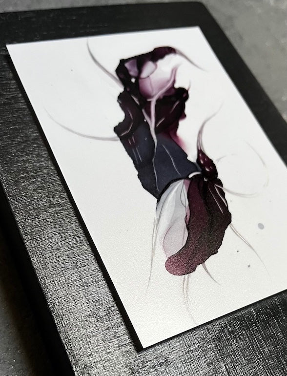 A surreal art piece featuring a gothic flower in dark, jewel tones of red purple and blue grey with lines inspired by plant tendrils and animals of the deep. Dark decor for a gothic home mounted on a cradled panel.