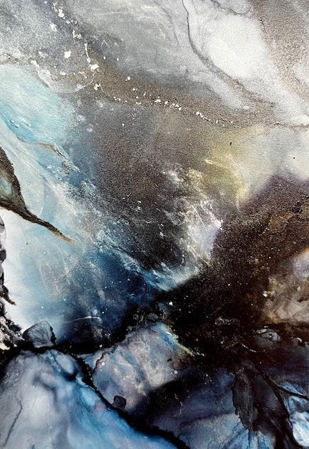 Close-up of an abstract artwork with ocean blue colours and shades of moody black.